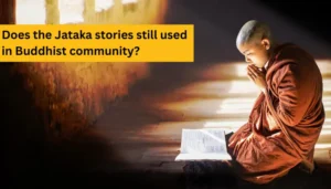 A Buddhist By is reading Jataka stories