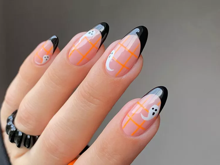 Classic French manicure with a modern design twist.